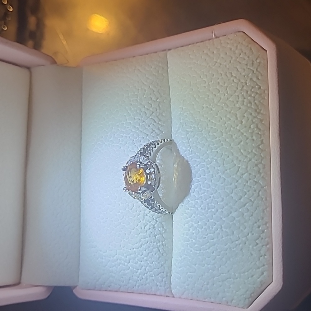 White gold with diamonds and 1.5 carat citrine.